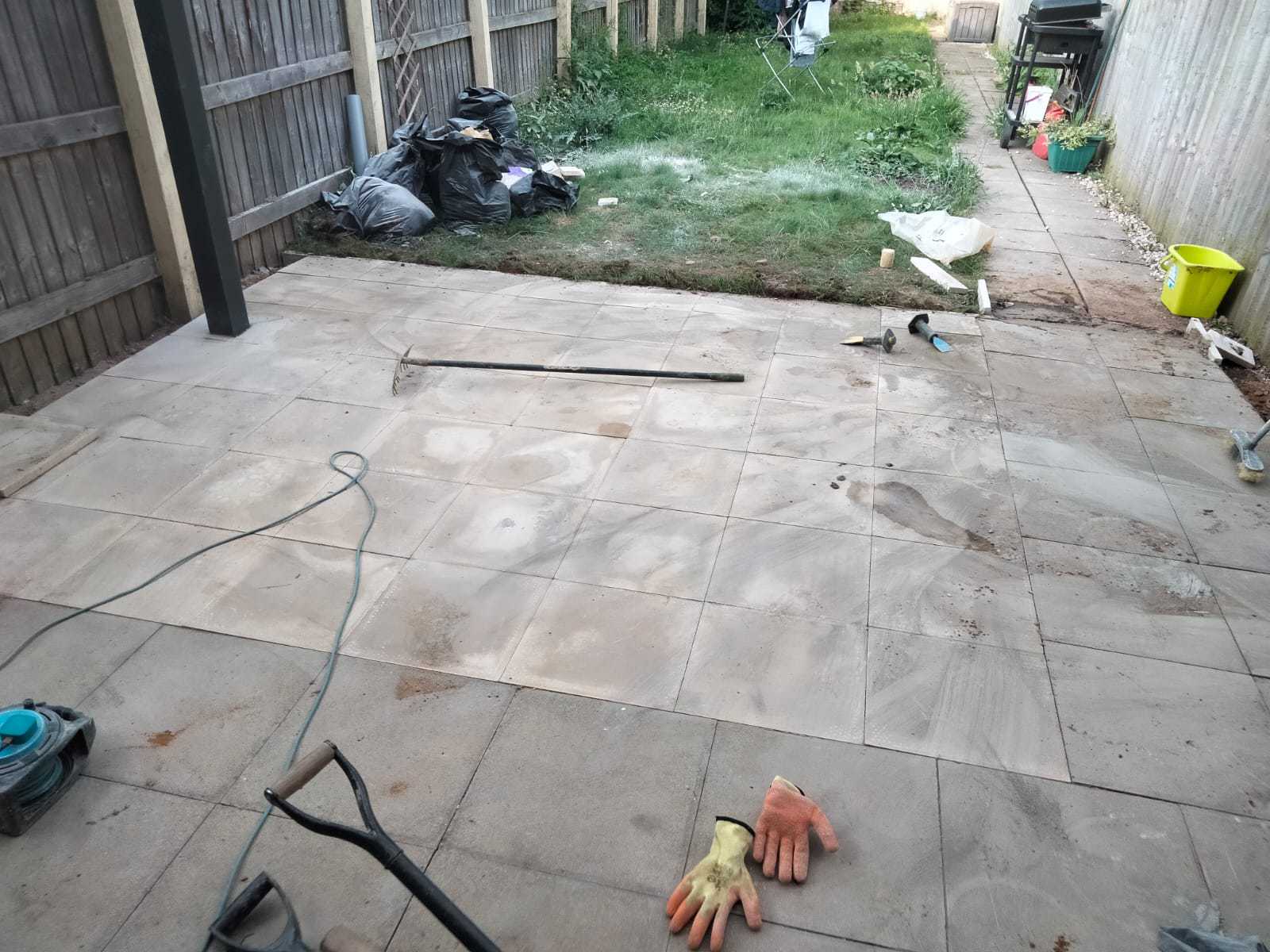 Garden ground works, dug out and relaid
