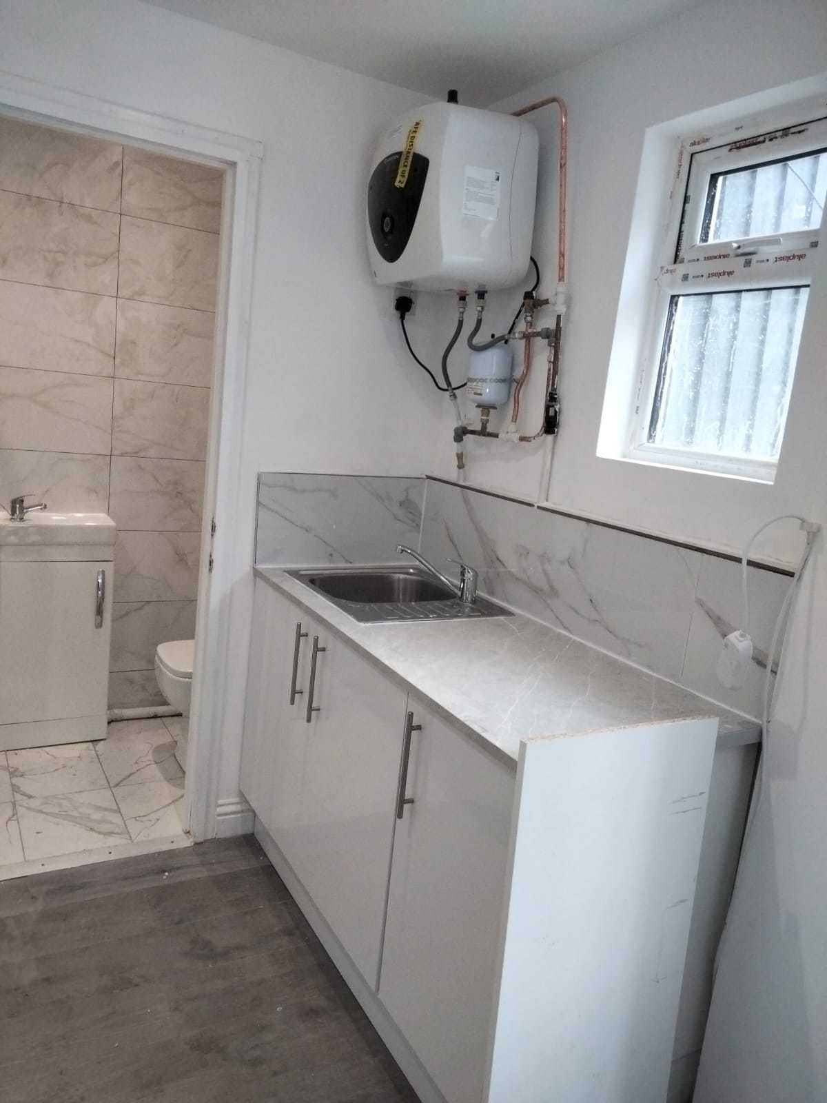 Garden renovation and garage conversion