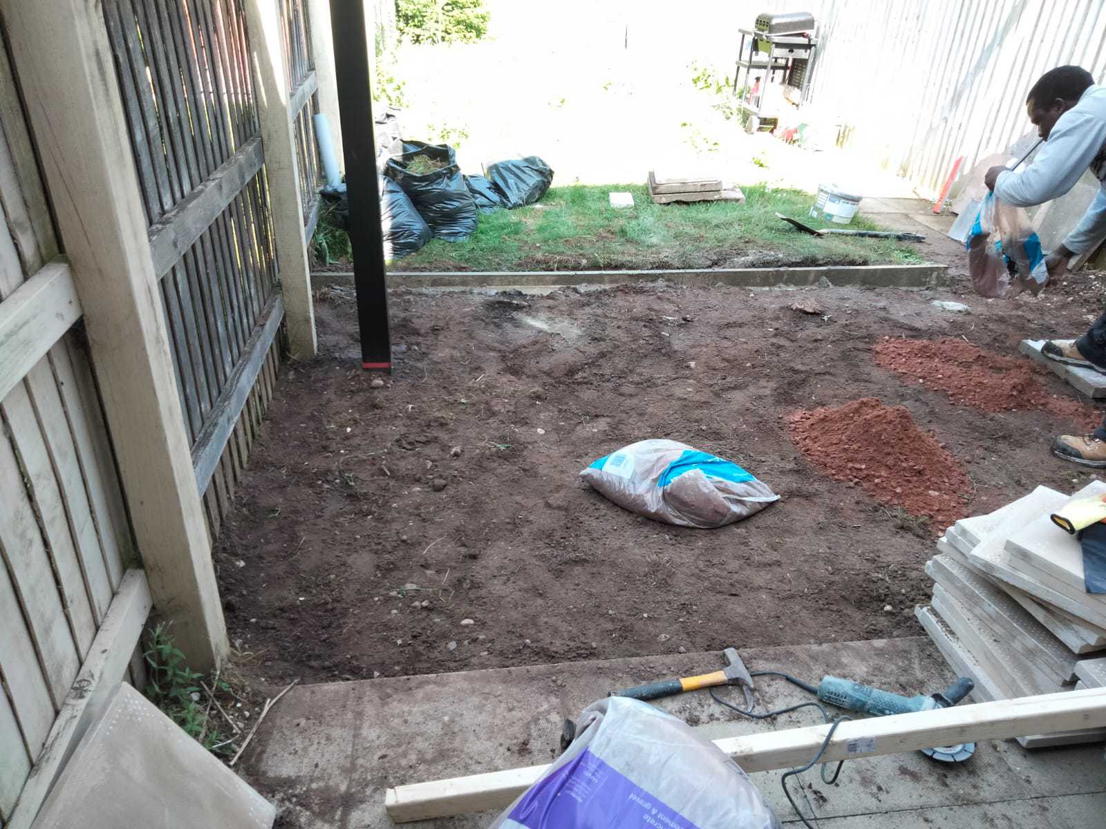 Garden ground works, dug out and relaid — before
